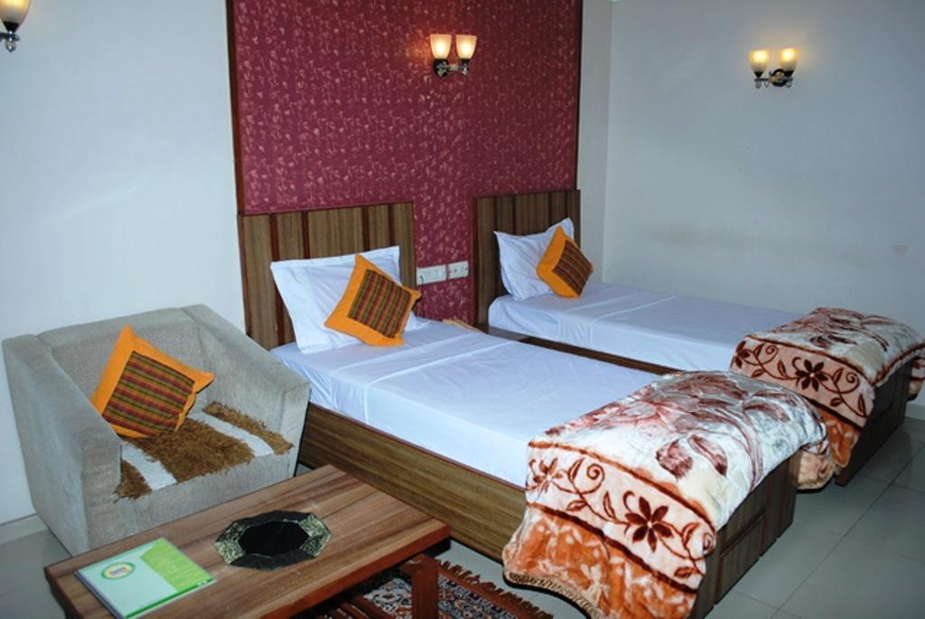 Hotel Eden Ahmedabad Quarto foto